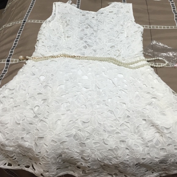 White laced dressed with see-through back