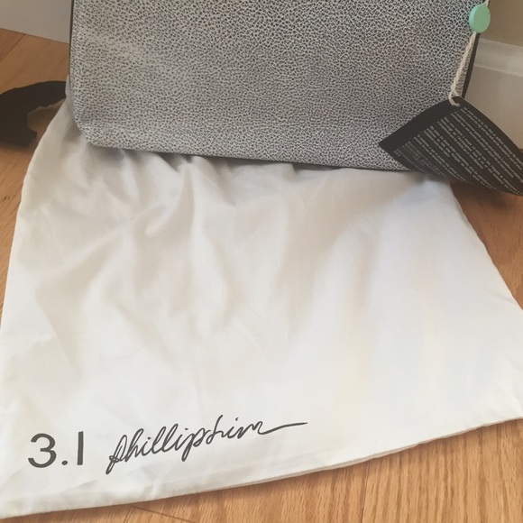 3.1 Philip Lim 31 Minute SIlver – Burgundy clutch