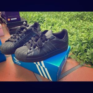 Adidas all black sneakers