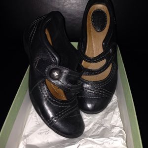 Black leather Clark work shoes.