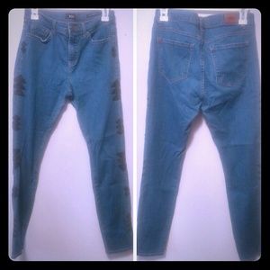 High rise UO jeans with leather arrow detail
