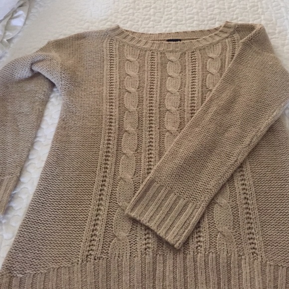 Beautiful beige sweater in excellent condition.