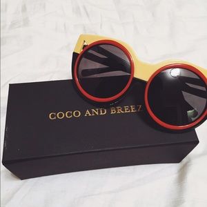 Thelma in yellow Coco and breezy sunglasses