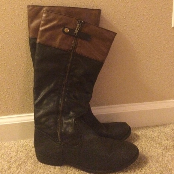 Black and brown riding boots