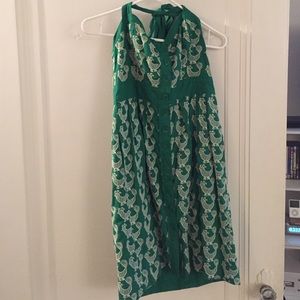 Green embroidered dress.