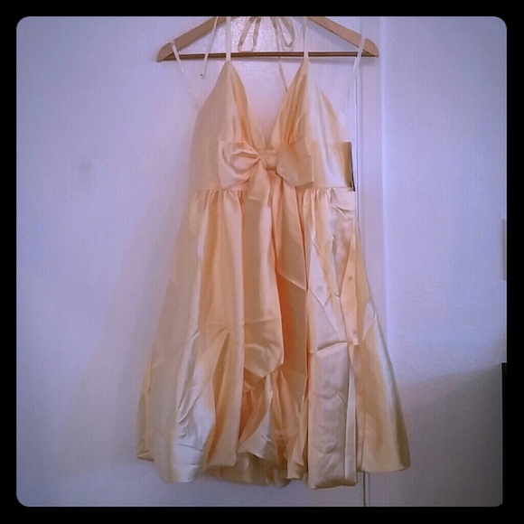 Warm yellow Jessica McMclintock party dress