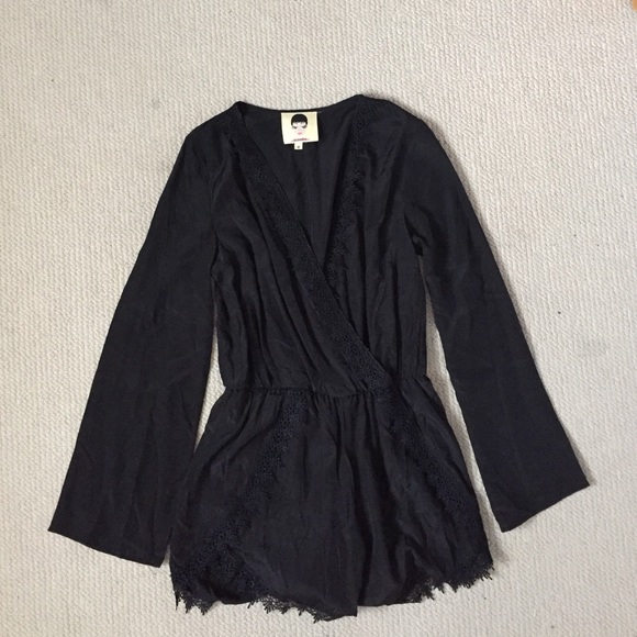 Lace trimmed black romper