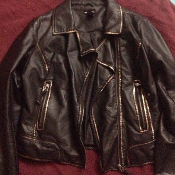 Nice gold trim and black faux leather jacket
