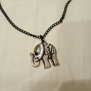 A cute vintage looking elephant necklace