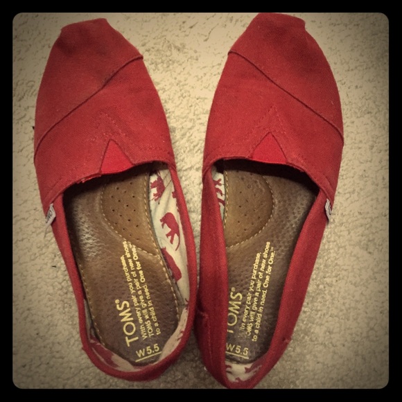 TOMS Shoes - TOMS red slip-ons size 5.5