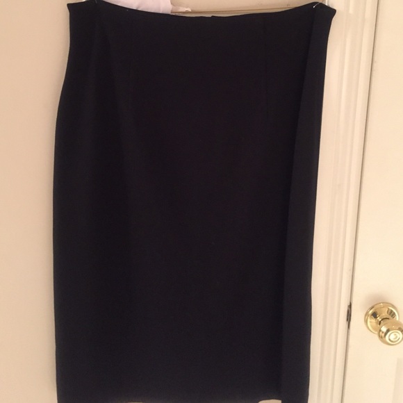 Yansi Fugel Dresses & Skirts - Yansi Fugel ponte black knit skirt.  Longer