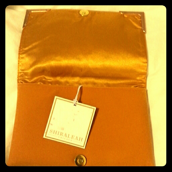 Mustard colored clutch