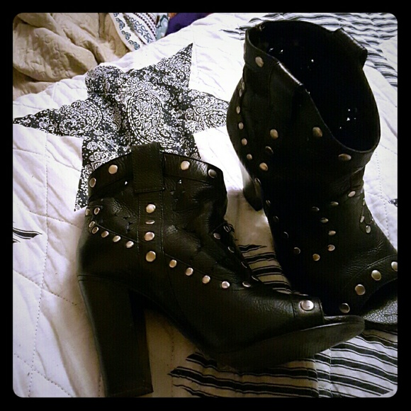 Designed heels, new without tags.