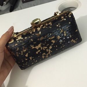 Camille La Vie black and gold clutch purse