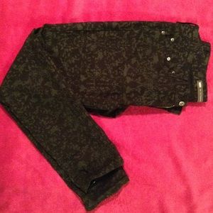 Black paint splattered Levi's