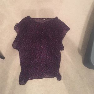 A purple fit and flare blouse