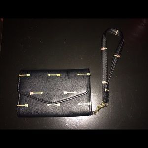Offers are welcome! Black with arrows wristlet!