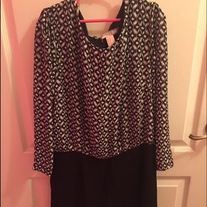 A black and white shirt romper