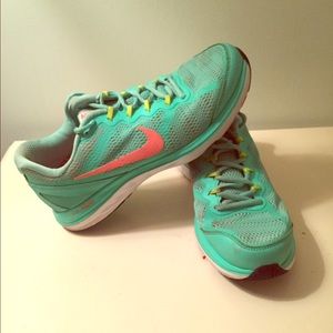Cute nike trainers in bright green and orange