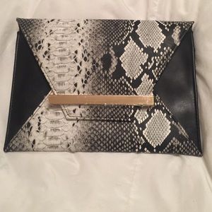 Snakeskin clutch.  Never used.