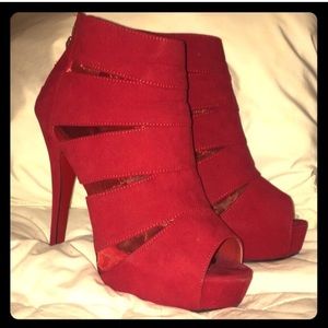 Red peep toe booties.