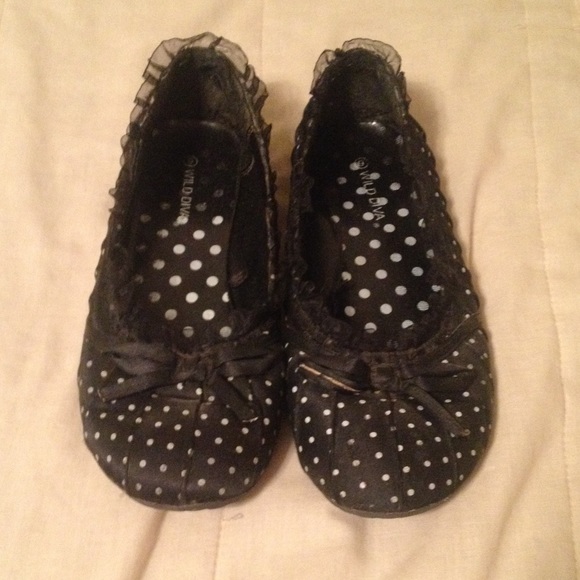 Black polka dotted flats