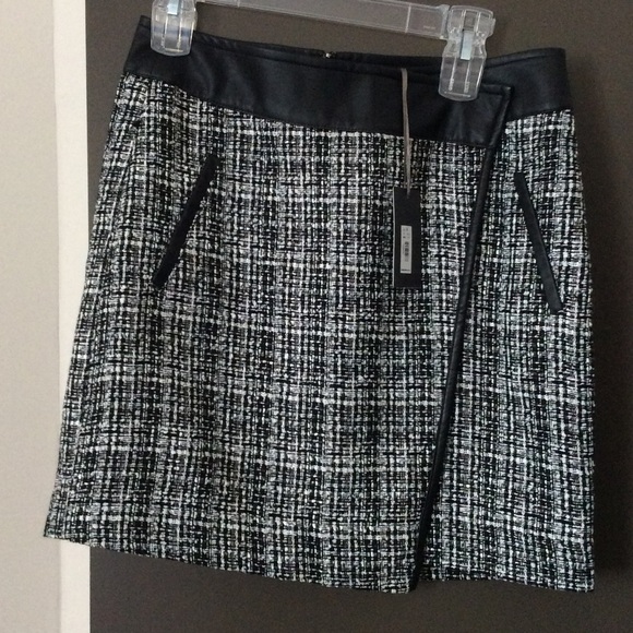 The Limited Dresses & Skirts - Super cute faux leather trimmed mini!💛