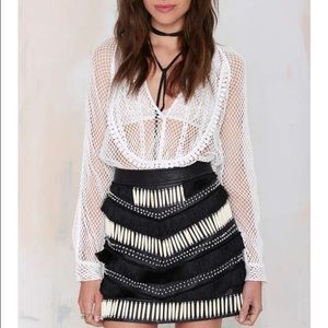 Bone & fringe skirt by Nasty Gal