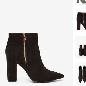Pointed zip up booties