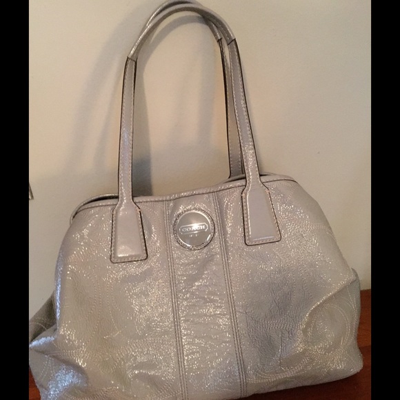 Silver COACH bag.