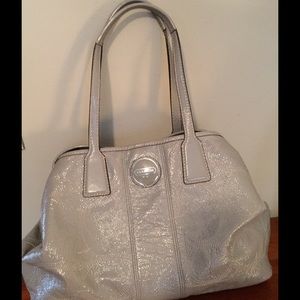 Silver COACH bag.