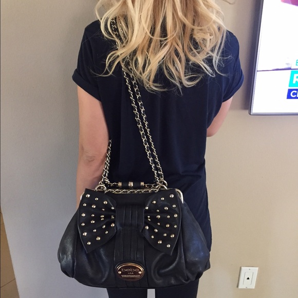 Black and gold Bebe shoulder purse