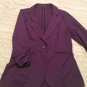 Maurice's purple blazer!