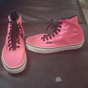 Hot pink high top vans