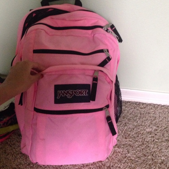 A pink jansport backpack