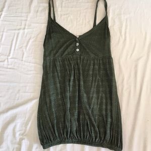 Green tank with tiny silver accents