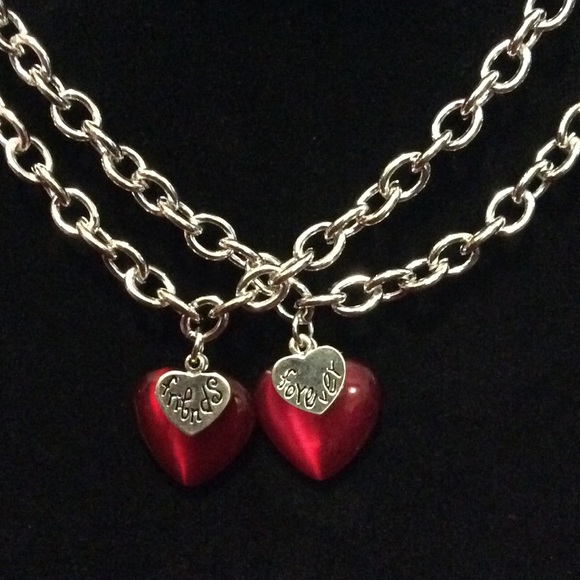 2 Friends Forever bracelets. Lovely red cat's-eye
