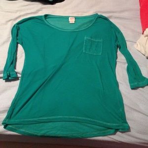 Light green, thin Tshirt. Size sm.