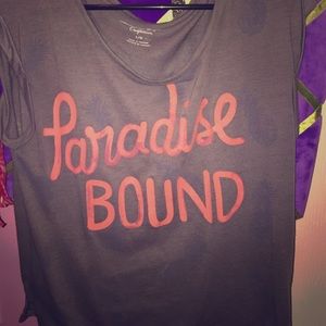 Shirt with grey pineapples and orange writing