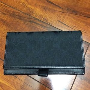 Black coach checkbook cover