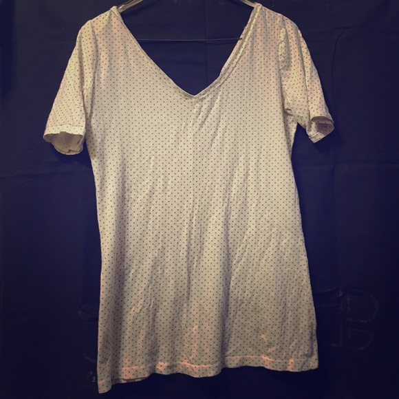 Decree large v-neck polka dot shirt.