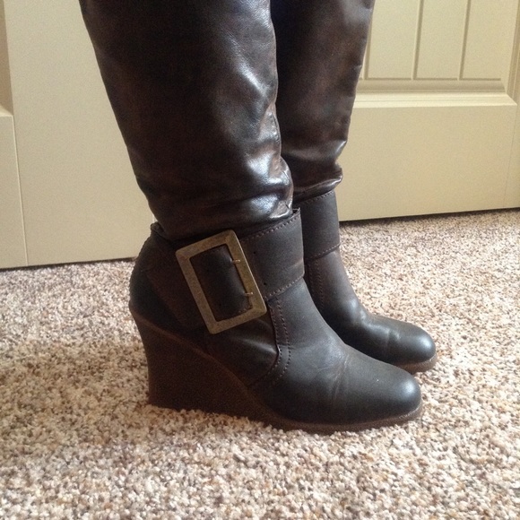 Brown wedge boots.