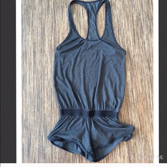 Super cute gray romper it dresses adorable !