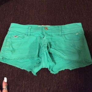 bright pastel green hollister shorts.