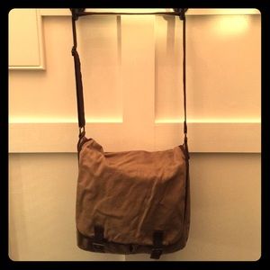 Tan and brown messenger bag.