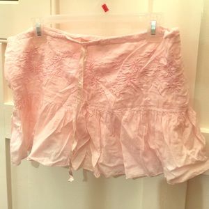 Pastel pink mini with ruffle skirt