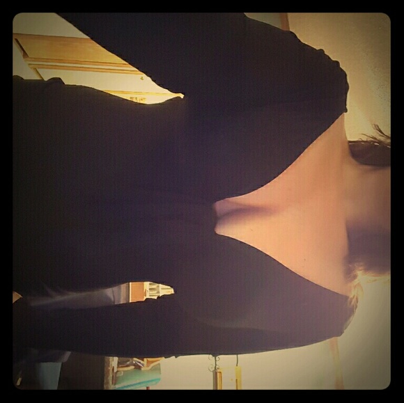Tight.  Black.  Plunge neckline dress.