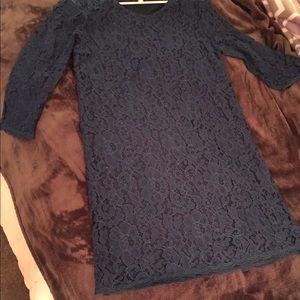 Beautiful lace dress. Also it has NEVER been worn
