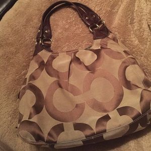 Tan and brown Coach purse