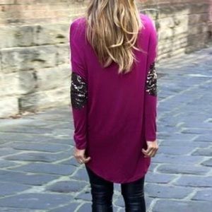 Boutique top with sparkly elbow patches